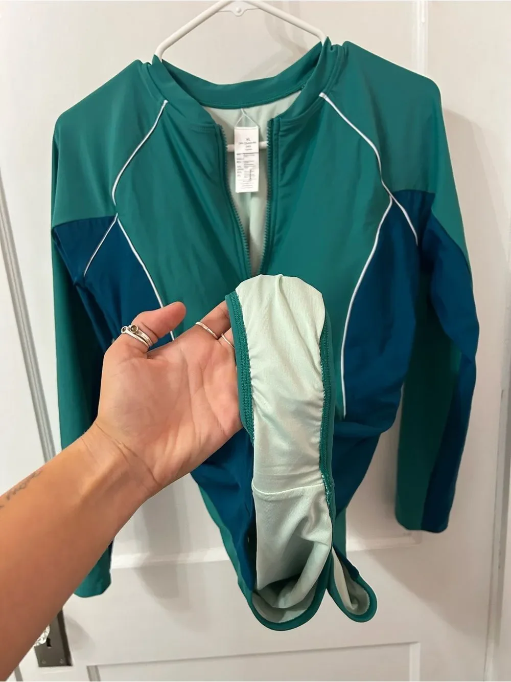 Never Worn Teal and Navy Long Sleeve Zip Front Swimsuit